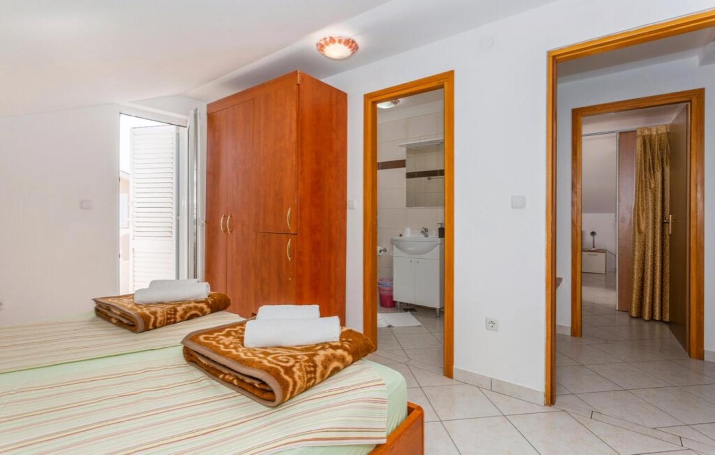 Guest House Lucija Banjol Pokoj fotografie