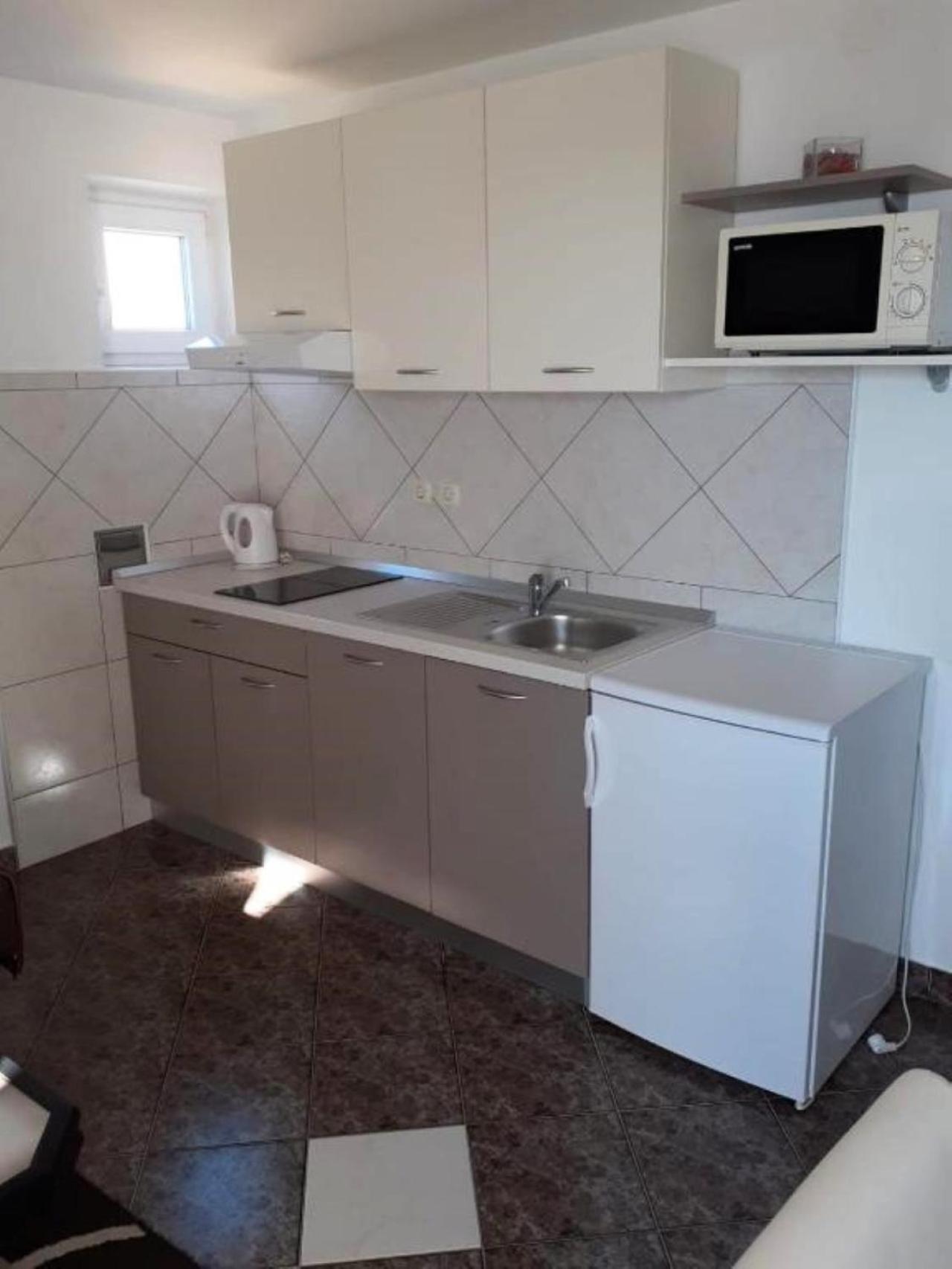 Guest House Lucija Banjol Pokoj fotografie